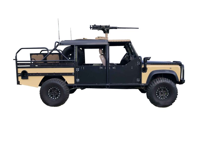 An incredible side shot photo of aLand Rover Defender 130 that you should buy.
