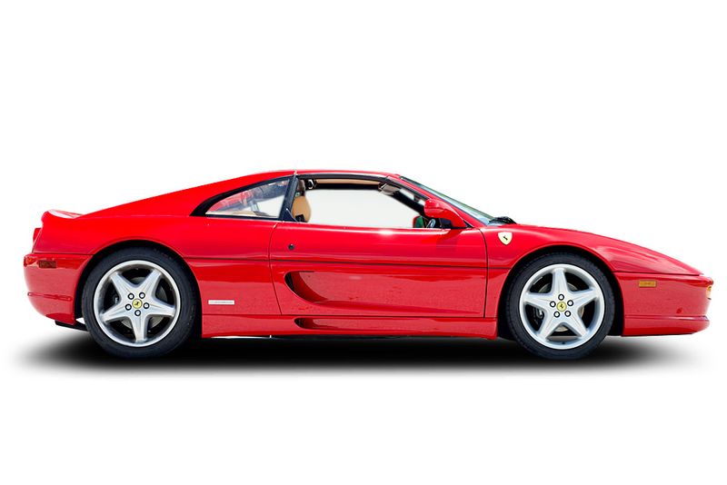 An incredible side shot photo of aFerrari F355 Spider that you should buy.