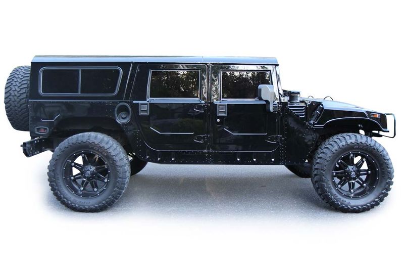 An incredible side shot photo of aAM General Hummer that you should buy.