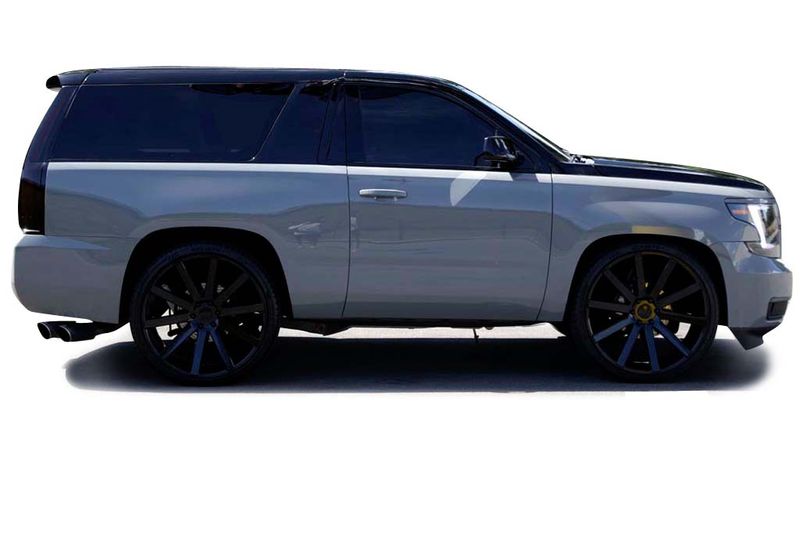 An incredible side shot photo of aChevrolet Suburban that you should buy.