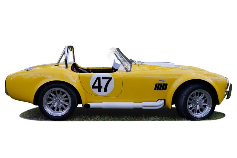 An incredible side shot photo of aShelby Cobra that you should buy.