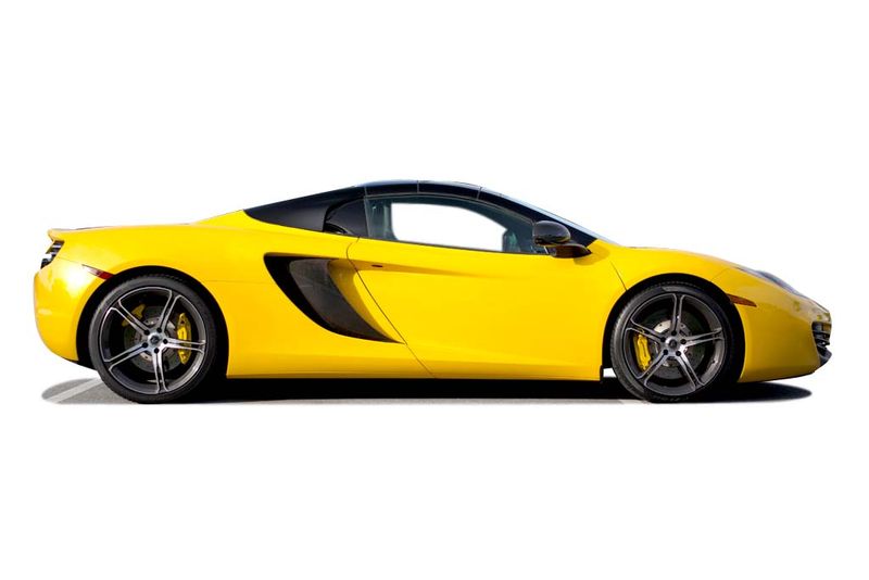 An incredible side shot photo of aMcLaren MP4-12C that you should buy.