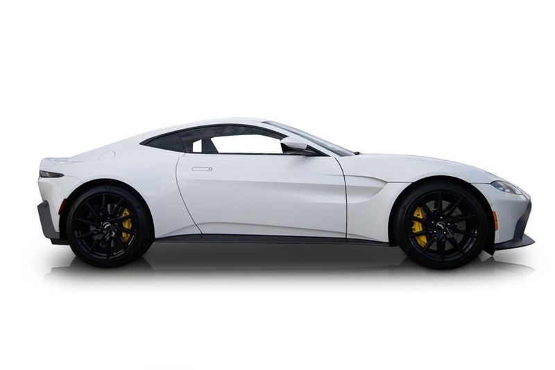 An incredible side shot photo of aAston Martin Vantage that you should buy.