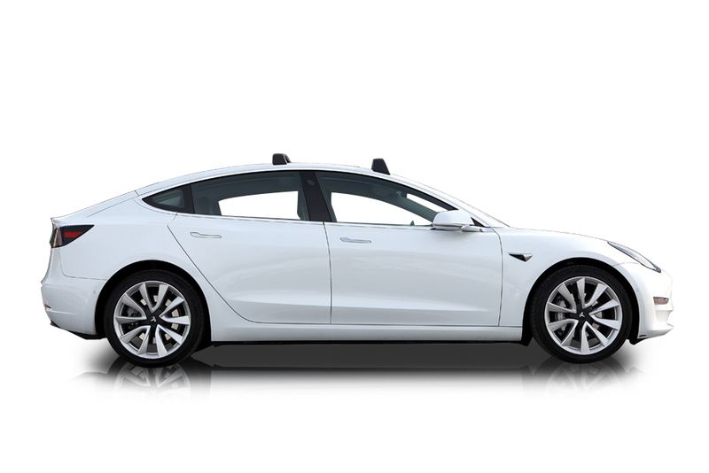 An incredible side shot photo of aTesla Model 3 that you should buy.