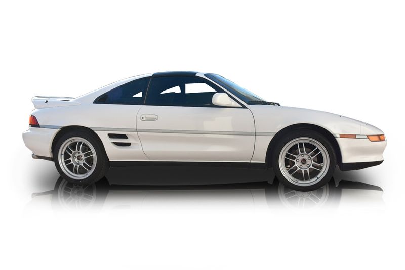 An incredible side shot photo of aToyota MR2 that you should buy.