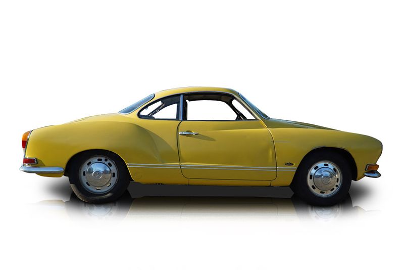 An incredible side shot photo of aVolkswagen Karmann Ghia that you should buy.