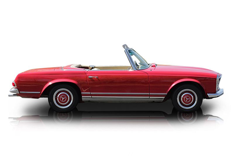 An incredible side shot photo of aMercedes-Benz 230SL that you should buy.