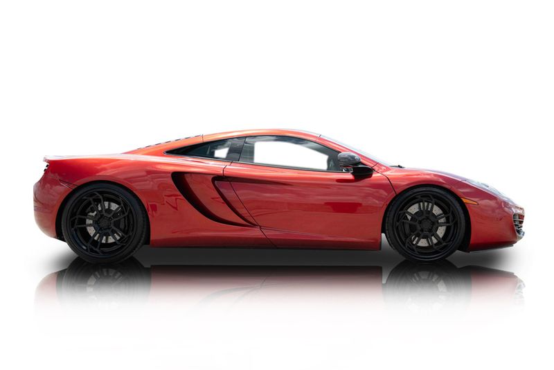 An incredible side shot photo of aMcLaren MP4-12C that you should buy.