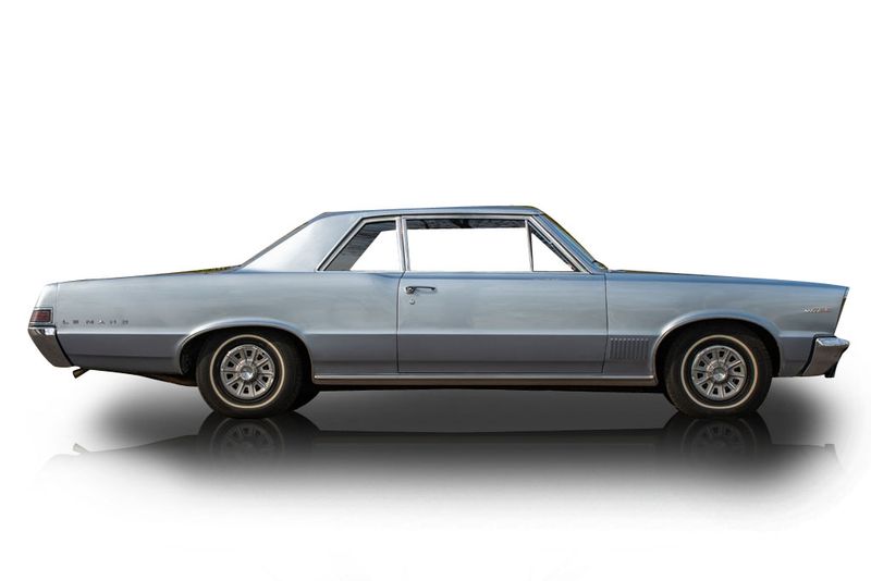 An incredible side shot photo of aPontiac LeMans that you should buy.