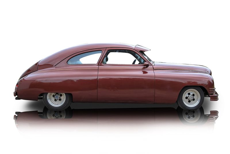 An incredible side shot photo of aPackard Coupe that you should buy.