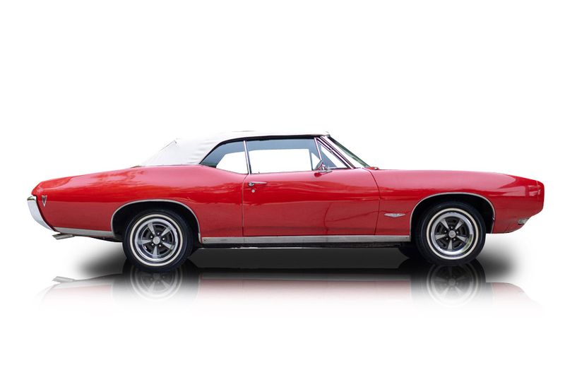An incredible side shot photo of aPontiac GTO that you should buy.