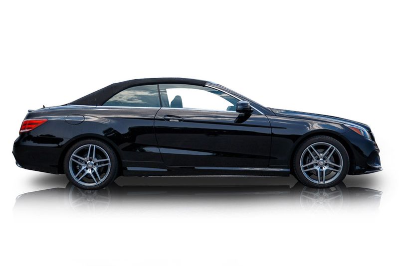 An incredible side shot photo of aMercedes-Benz E400 that you should buy.