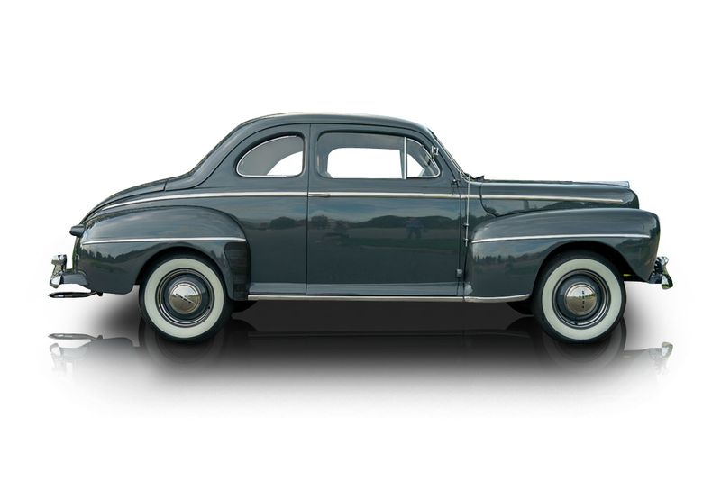 An incredible side shot photo of aFord Super Deluxe that you should buy.
