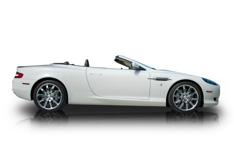 An incredible side shot photo of aAston Martin DB9 that you should buy.