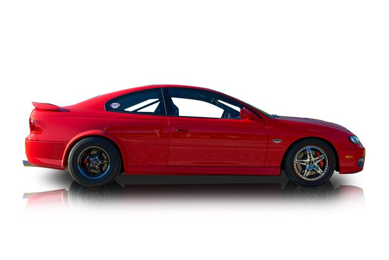 An incredible side shot photo of aPontiac GTO that you should buy.