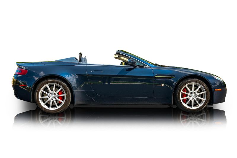 An incredible side shot photo of aAston Martin V8 Vantage that you should buy.