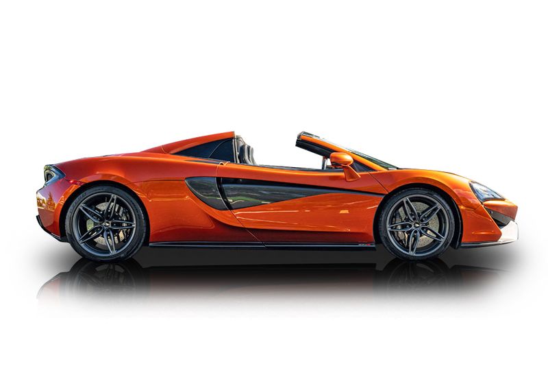 An incredible side shot photo of aMcLaren 570S that you should buy.