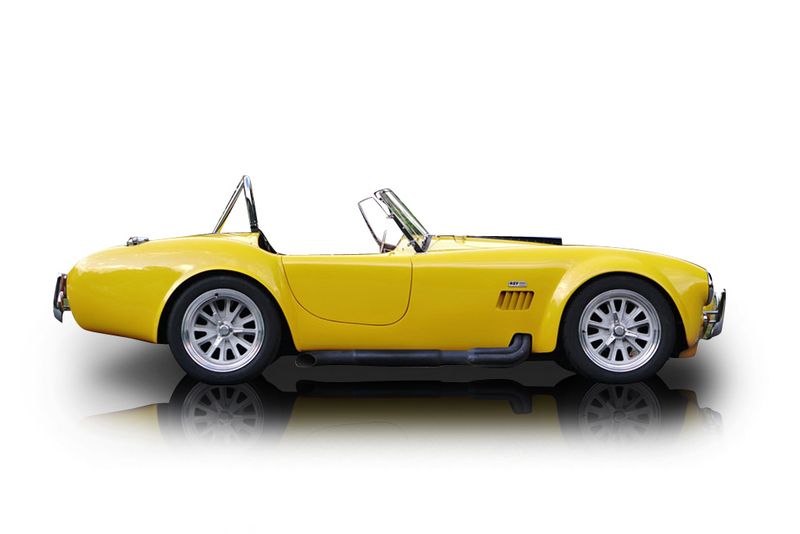 An incredible side shot photo of aShelby Cobra that you should buy.