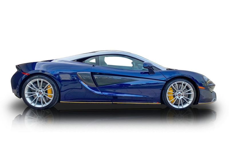 An incredible side shot photo of aMcLaren 570S that you should buy.