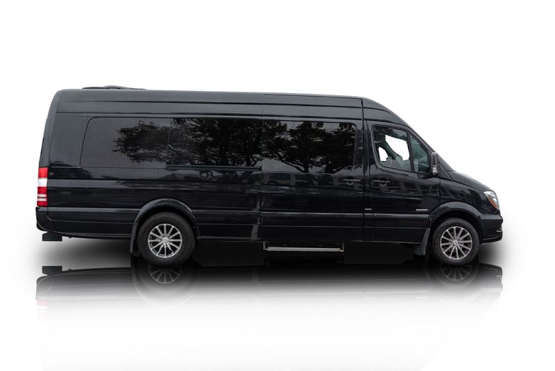 An incredible side shot photo of aMercedes-Benz Sprinter 3500 that you should buy.