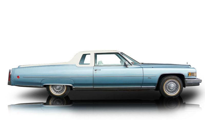 An incredible side shot photo of aCadillac DeVille that you should buy.