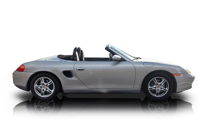 An incredible side shot photo of aPorsche Boxster that you should buy.