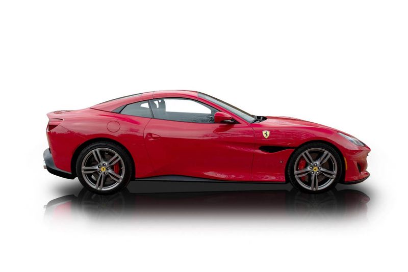 An incredible side shot photo of aFerrari Portofino that you should buy.