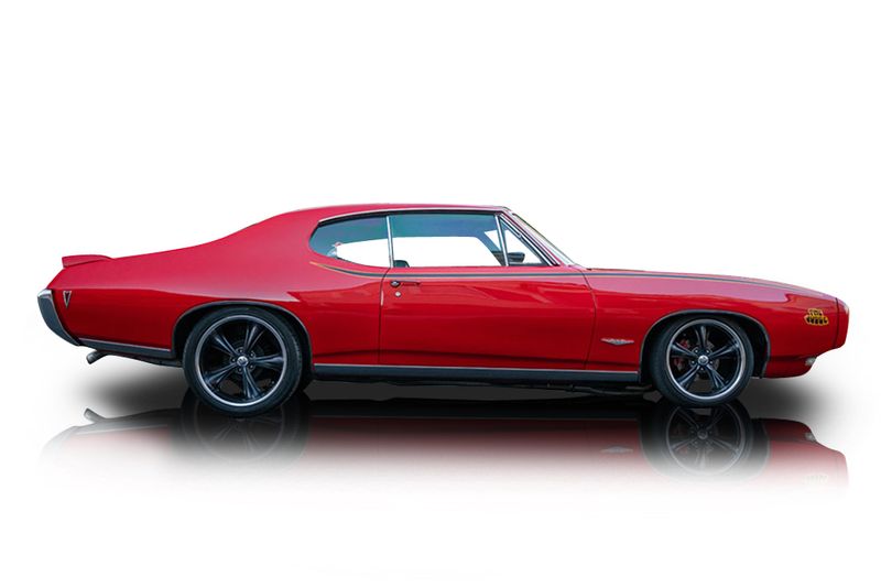 An incredible side shot photo of aPontiac GTO that you should buy.