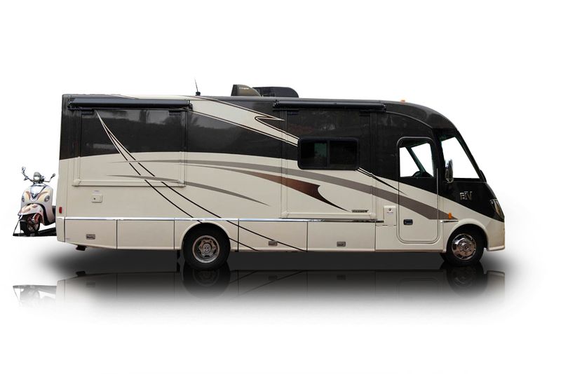 An incredible side shot photo of aWinnebago Via that you should buy.