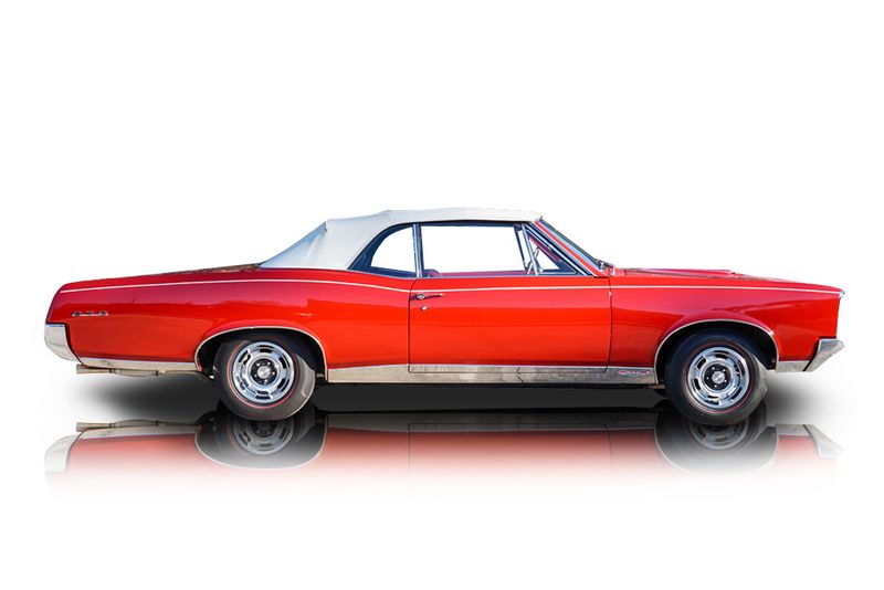 An incredible side shot photo of aPontiac GTO that you should buy.