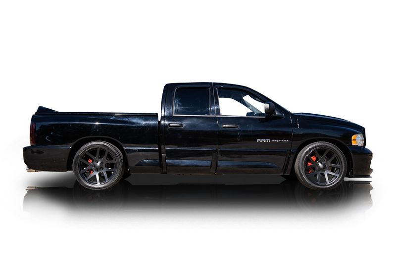 An incredible side shot photo of aDodge Ram 1500 that you should buy.