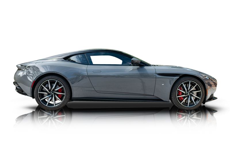An incredible side shot photo of aAston Martin DB11 that you should buy.