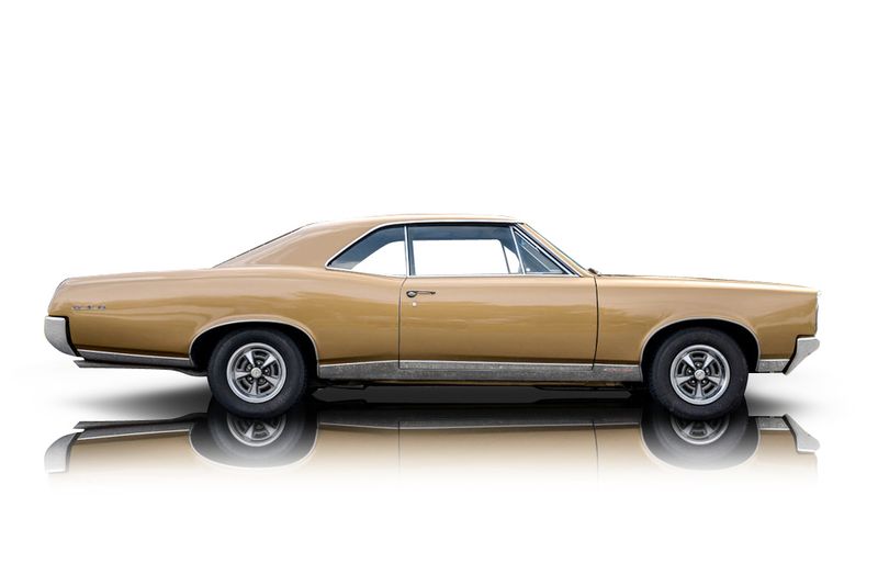 An incredible side shot photo of aPontiac GTO that you should buy.