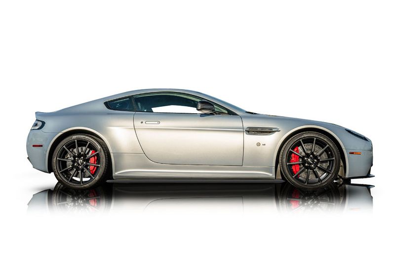 An incredible side shot photo of aAston Martin V12 Vantage that you should buy.