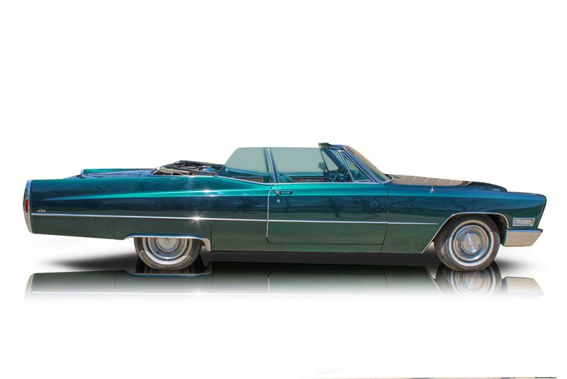 An incredible side shot photo of aCadillac DeVille that you should buy.