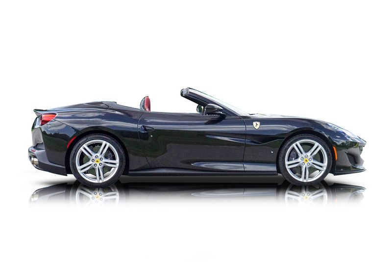 An incredible side shot photo of aFerrari Portofino that you should buy.