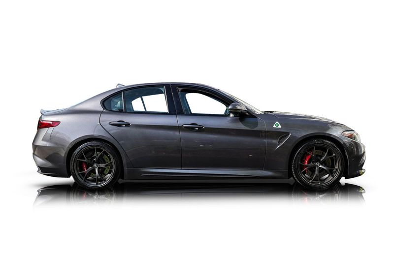 An incredible side shot photo of aAlfa Romeo Giulia that you should buy.