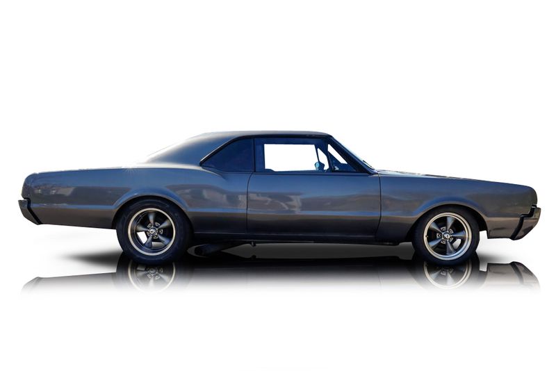 An incredible side shot photo of aOldsmobile Cutlass that you should buy.