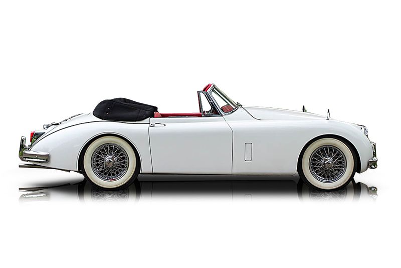 An incredible side shot photo of aJaguar XK150 that you should buy.