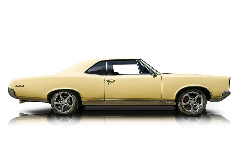 An incredible side shot photo of aPontiac GTO that you should buy.