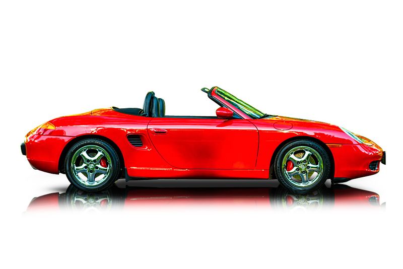 An incredible side shot photo of aPorsche Boxster that you should buy.