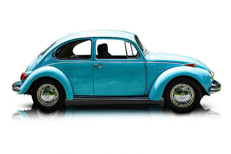 An incredible side shot photo of aVolkswagen Super Beetle that you should buy.