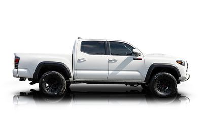 Passenger side photo of 2021 Toyota Tacoma