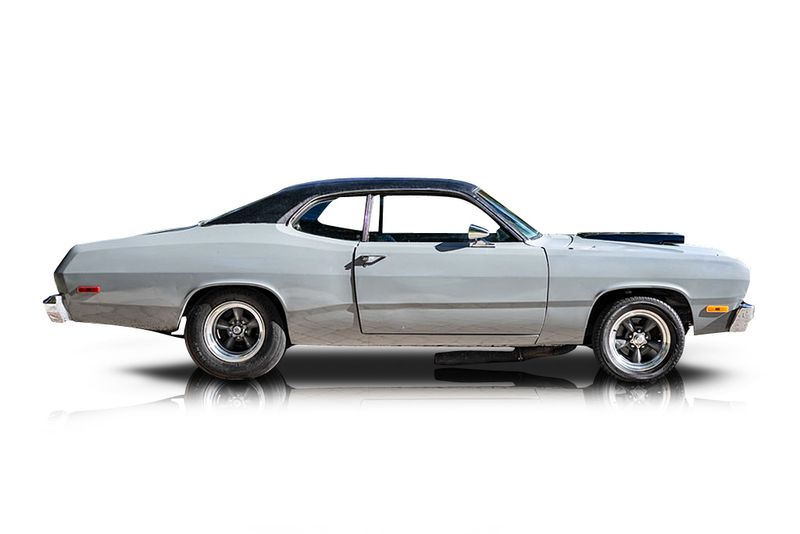 An incredible side shot photo of aPlymouth Duster that you should buy.