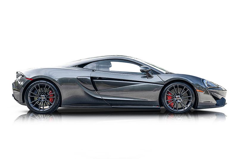 An incredible side shot photo of aMcLaren 570S that you should buy.