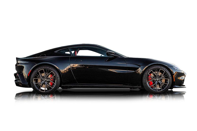 An incredible side shot photo of aAston Martin Vantage that you should buy.
