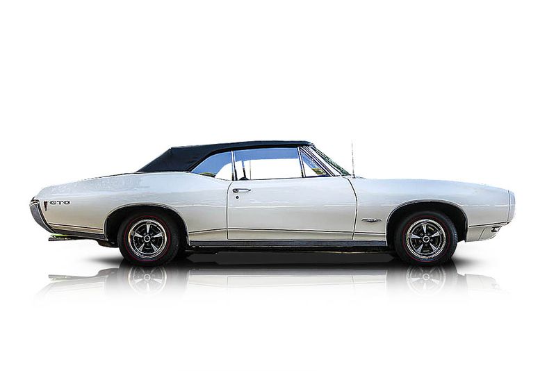 An incredible side shot photo of aPontiac GTO that you should buy.