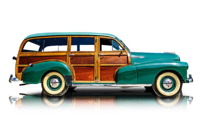 An incredible side shot photo of aPlymouth Deluxe PE Model that you should buy.