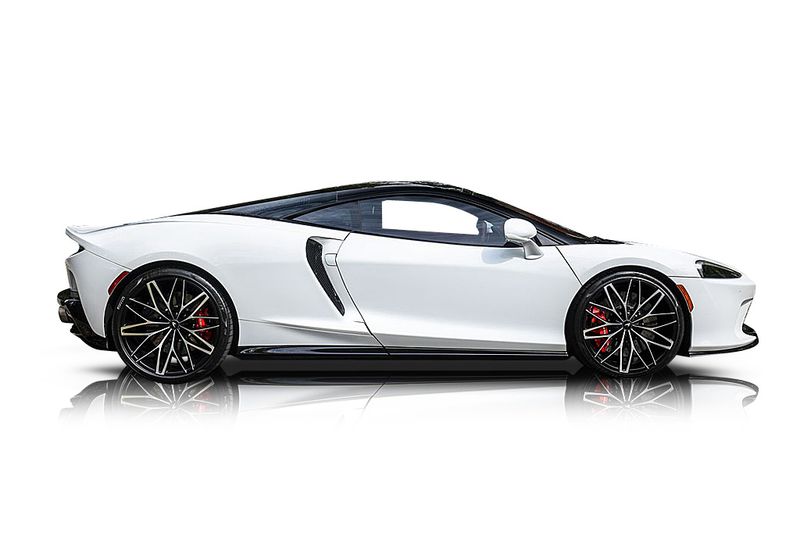An incredible side shot photo of aMcLaren GT that you should buy.