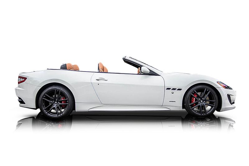 An incredible side shot photo of aMaserati GranTurismo that you should buy.